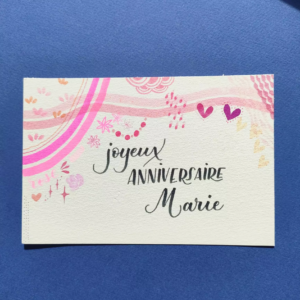 carte d'anniversaire dans les tons roses